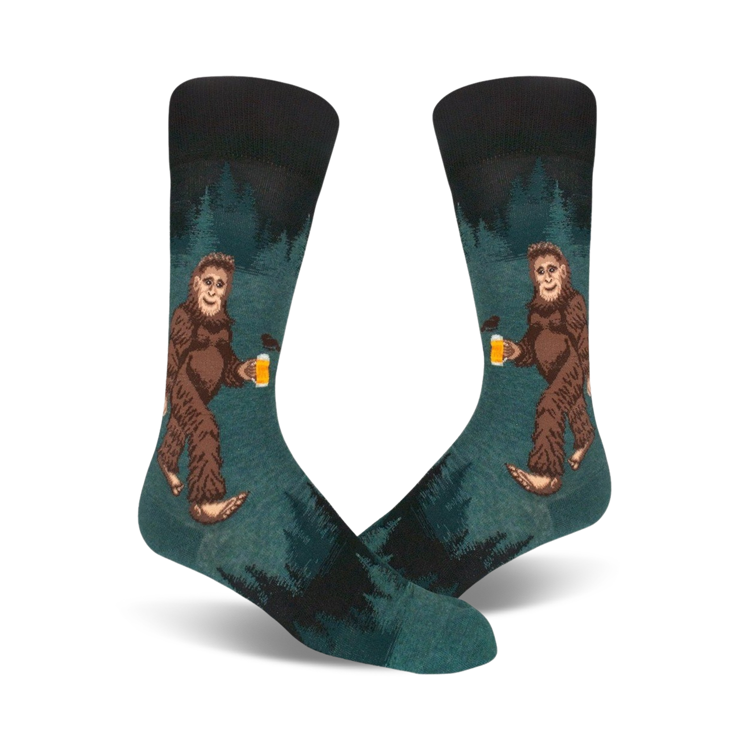 Pair of teal crew socks depicting a Bigfoot character enjoying a beer in a forest setting. Darker teal and black accents.