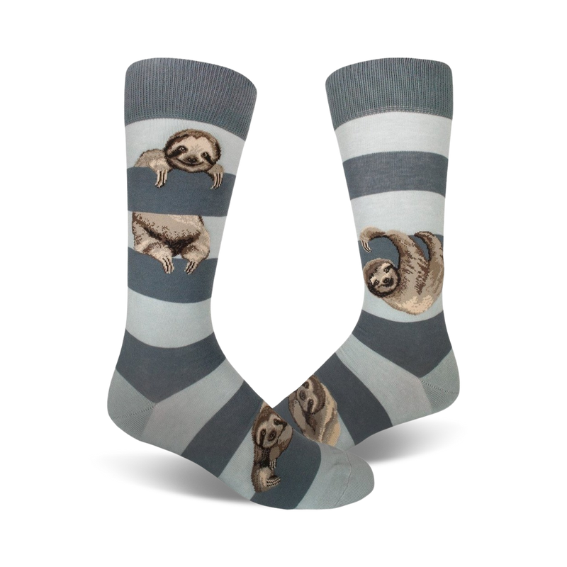 Pair of crew socks in blue and gray stripes.  Adorable sloths peek from behind the stripes. 