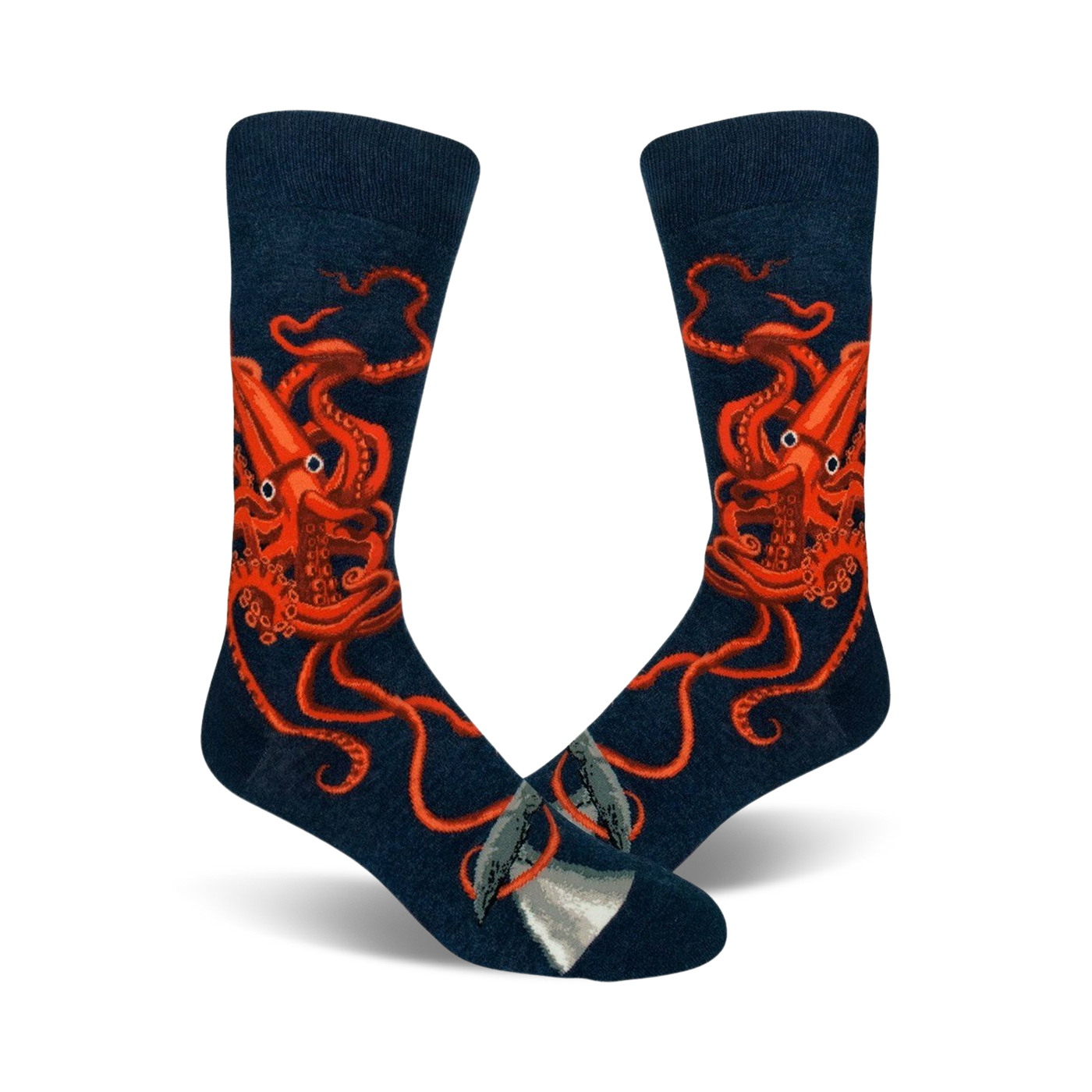 A pair of navy blue crew socks with a detailed illustration of a giant squid in bright orange.  A small whale is visible near the toes.