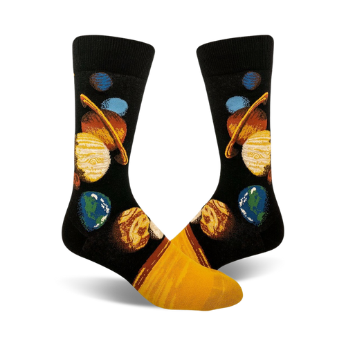 A pair of crew socks with a black background displaying a colorful illustration of the planets in our solar system. Yellow accents at the bottom.