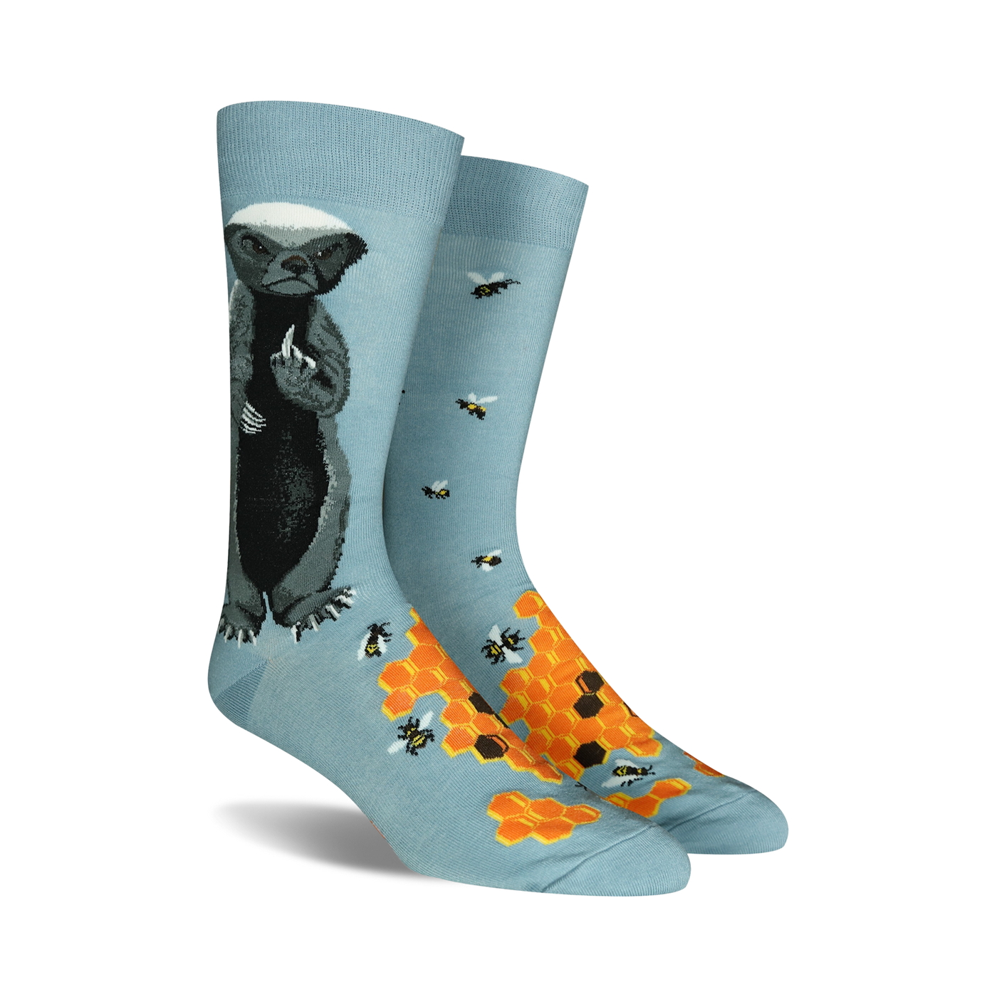 Lifestyle shot of Honey Badger socks being worn outdoors.  Shows the socks on a person's feet in a natural setting.