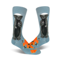 Pair of crew socks; light blue with a honey badger giving the middle finger, honeycomb, and bees illustrated.