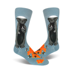 Pair of crew socks; light blue with a honey badger giving the middle finger, honeycomb, and bees illustrated.