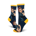 Crew socks in navy blue and yellow, featuring a Rosie the Riveter design. The iconic image shows Rosie flexing her bicep.