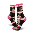 Crew socks in black with repeating images of pugs and pink lips.  A fun and playful design.
