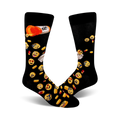 Pair of black crew socks with a fun design.  Features yellow emojis, red and orange pills, and a prescription label.