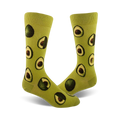 Pair of crew socks in light green with a repeating pattern of illustrated avocado slices.  Fun and quirky design!