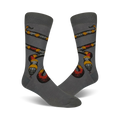 Pair of gray crew socks with a detailed coral snake design in red, yellow, black and white.