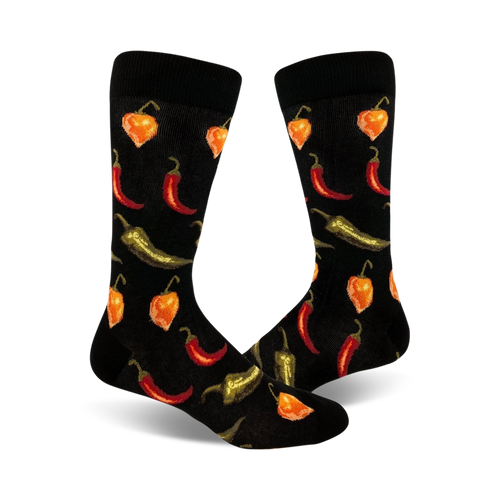 Pair of black crew socks with a fun pattern of red, orange, and green chili peppers of varying types.