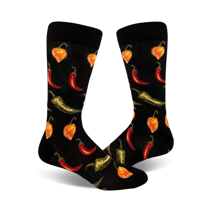 mens crew socks with all over pattern of chili peppers in red, orange, and green.   }}