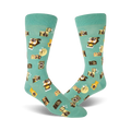 Pair of teal crew socks with a whimsical pattern of retro cameras and flashes in yellow and brown. Fun and quirky style.