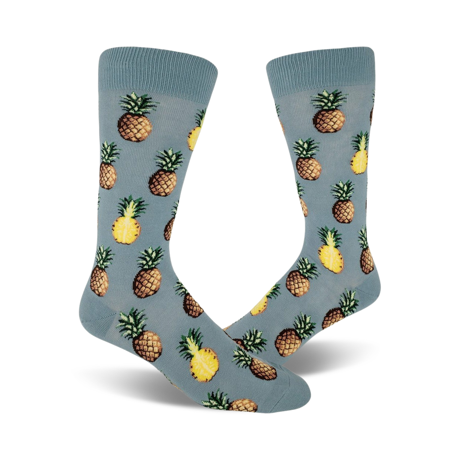 Close up view of a pair of blue crew socks with a repeated pineapple pattern. Pineapples are yellow and brown.