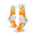 A pair of off-white crew socks featuring a repeating pattern of bright orange California poppies and green foliage.