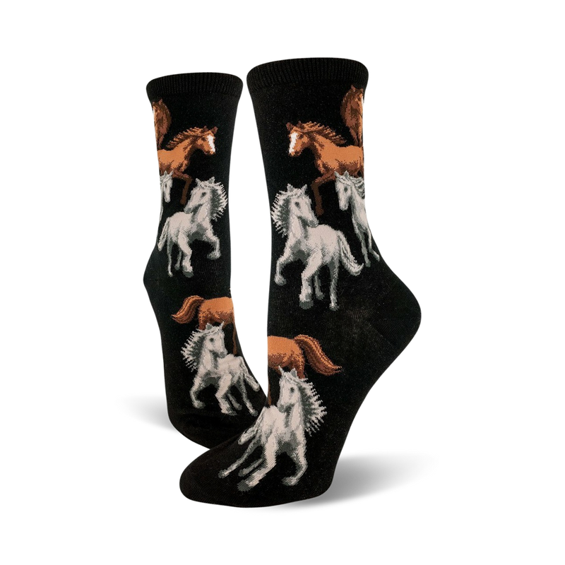 A pair of black crew socks with a repeating pattern of brown and white horses. The horses are depicted in a stylized, slightly whimsical manner.