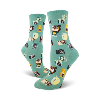 women's crew socks in mint green with vintage camera pattern in brown, black, yellow. 