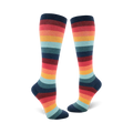 Pair of women's knee-high socks in a retro rainbow stripe pattern. Colors include teal, orange, red, and dark blue.