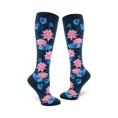 Pair of navy blue knee-high socks with a pattern of pink and teal lotus flowers and leaves.