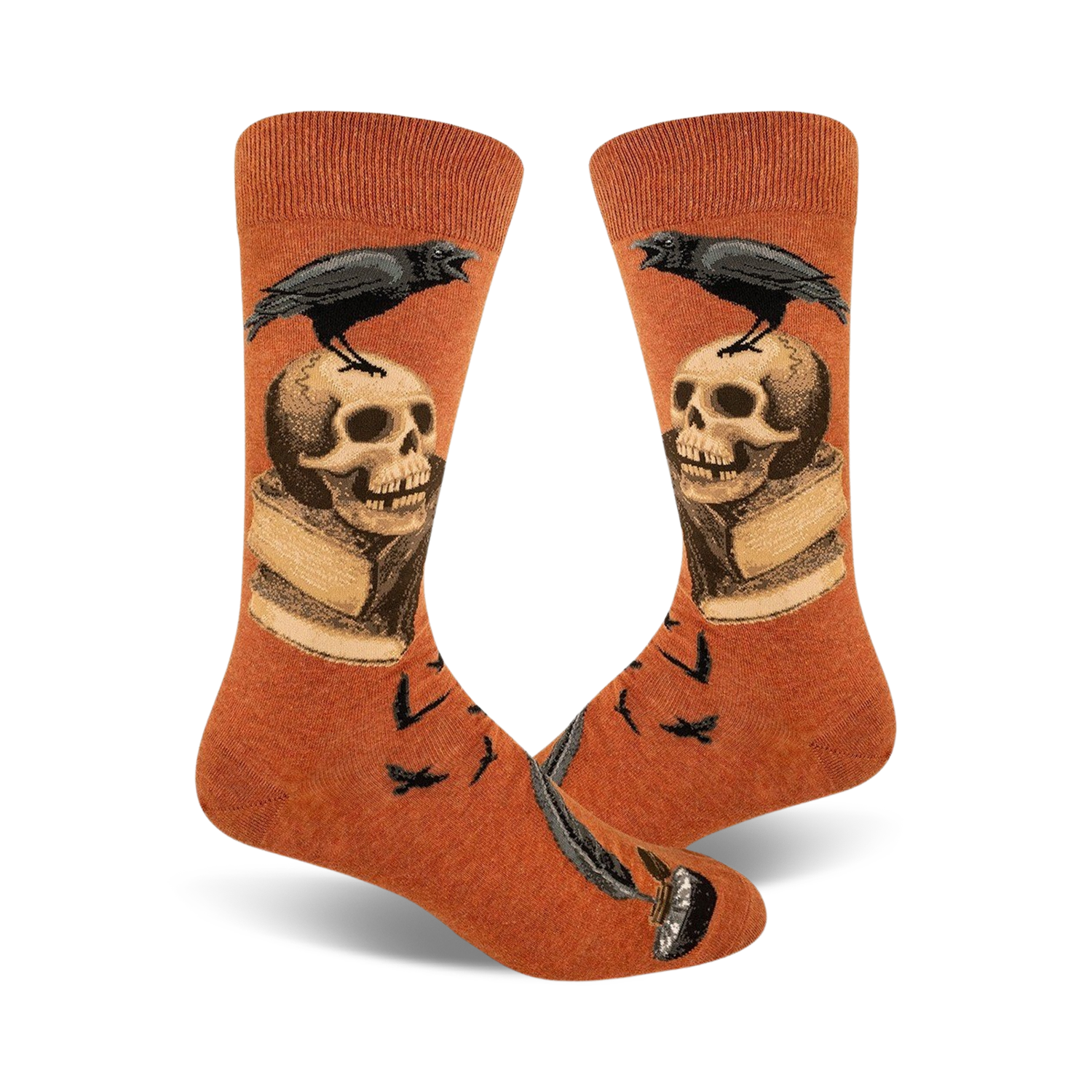 Pair of burnt orange crew socks.  A black raven perches on a skull resting on an open book, with a quill pen at the bottom.  Small ravens also in the background.