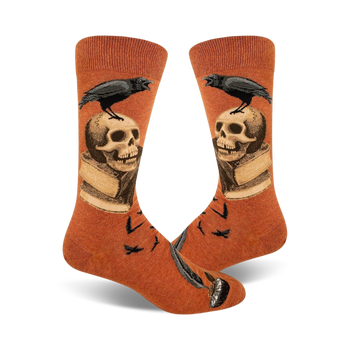 crew length nevermore socks for men in orange with skulls, ravens, and books pattern.   