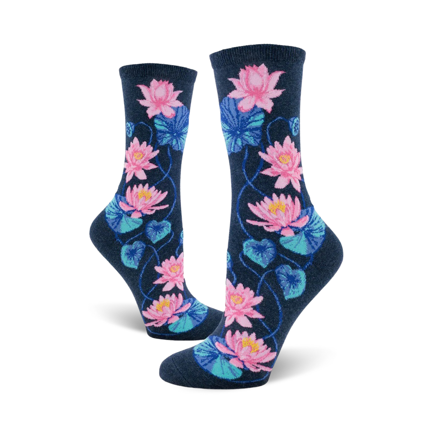 A pair of women's crew socks in navy blue, decorated with a pattern of pink and teal water lilies and leaves.
