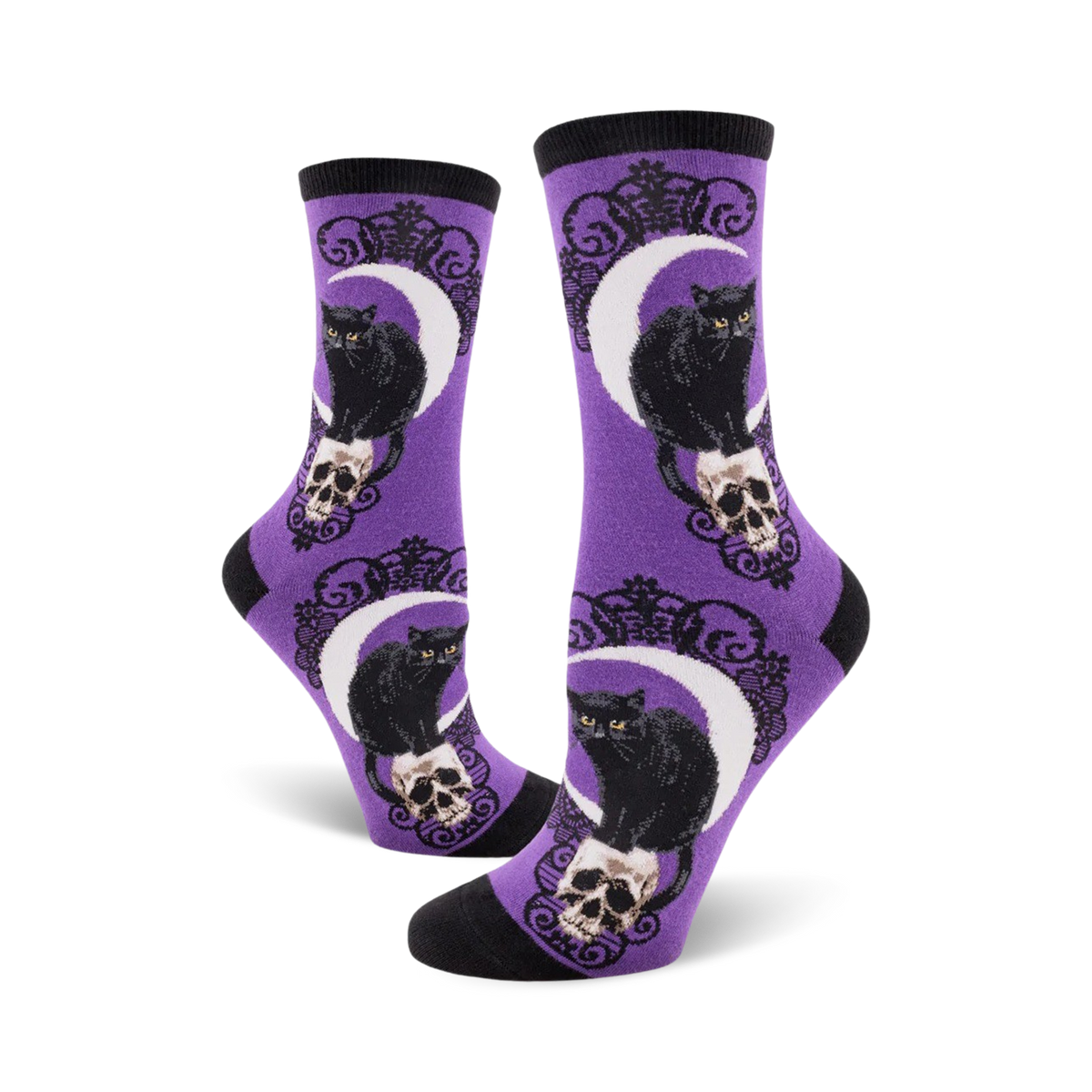 Lifestyle shot showing the purple Black Cat Moon socks on a model's feet.