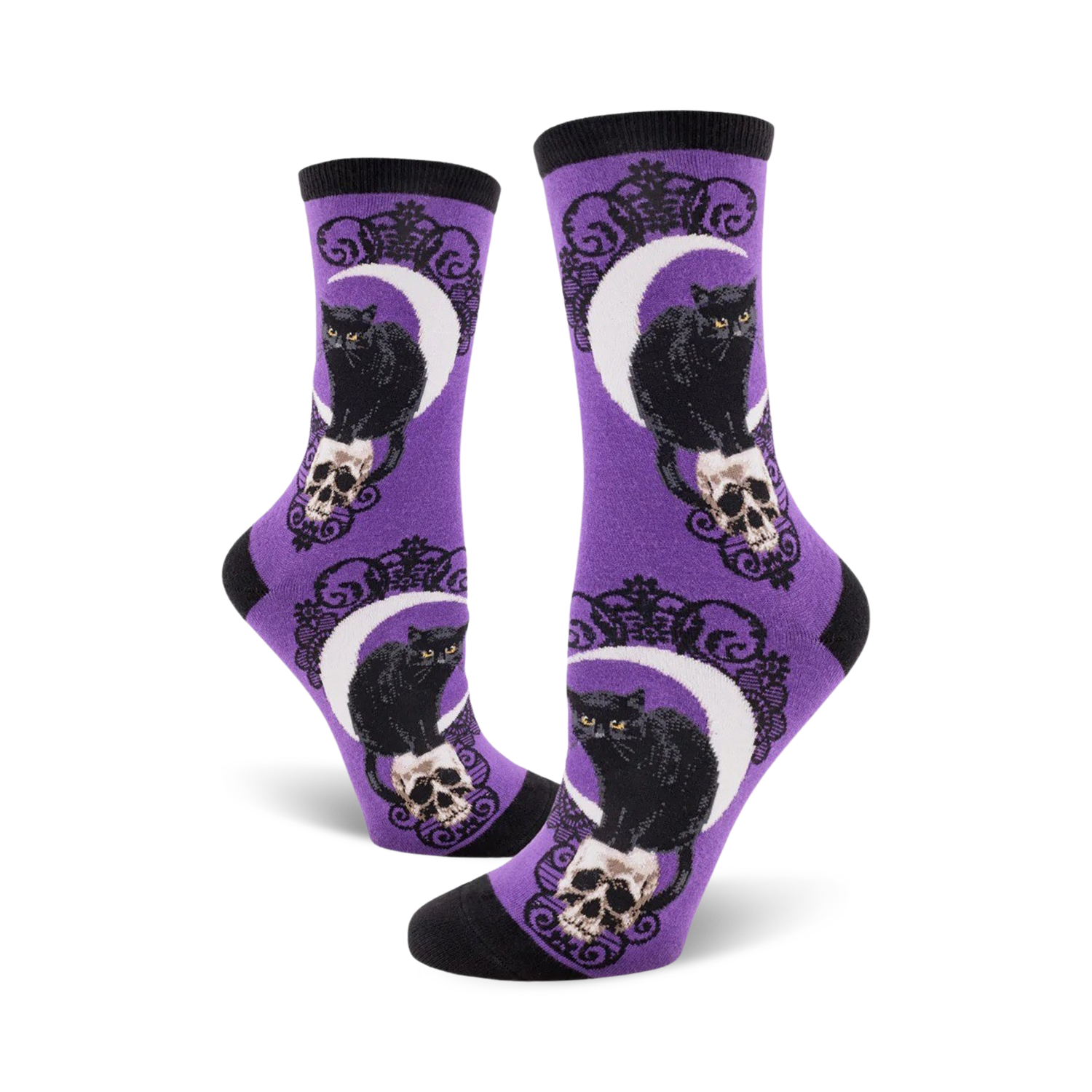 Lifestyle shot showing the purple Black Cat Moon socks on a model's feet.