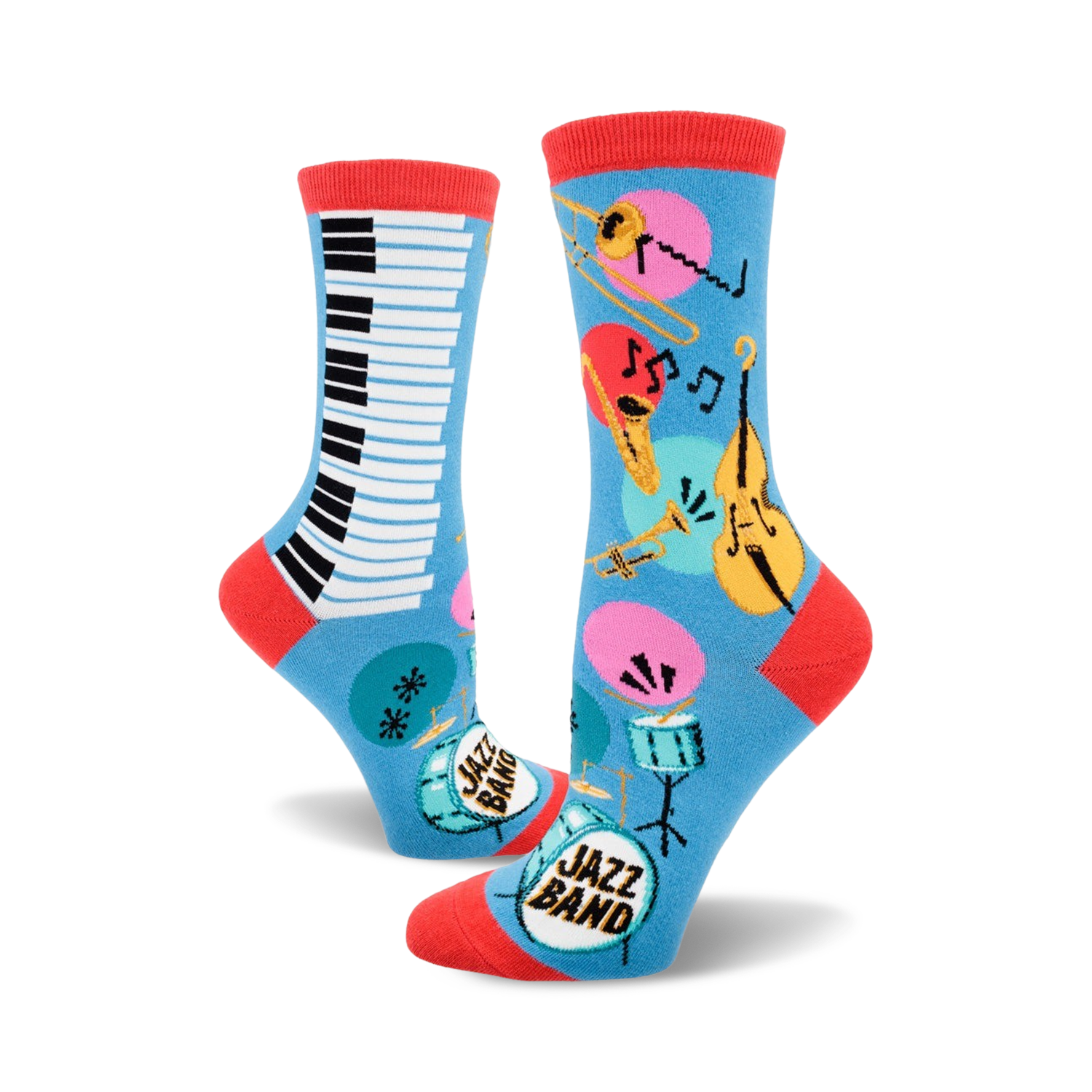 A pair of blue crew socks with a jazz band theme. One sock shows a piano keyboard, the other features musical instruments like a trombone, trumpet, and double bass.