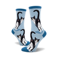 Lifestyle shot showing the light blue Tuxedo Cat Butt socks on a person's feet,  emphasizing the fun design.