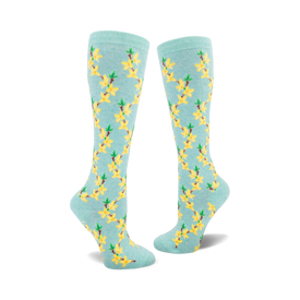 light blue knee high socks with yellow flowers and green leaves.  