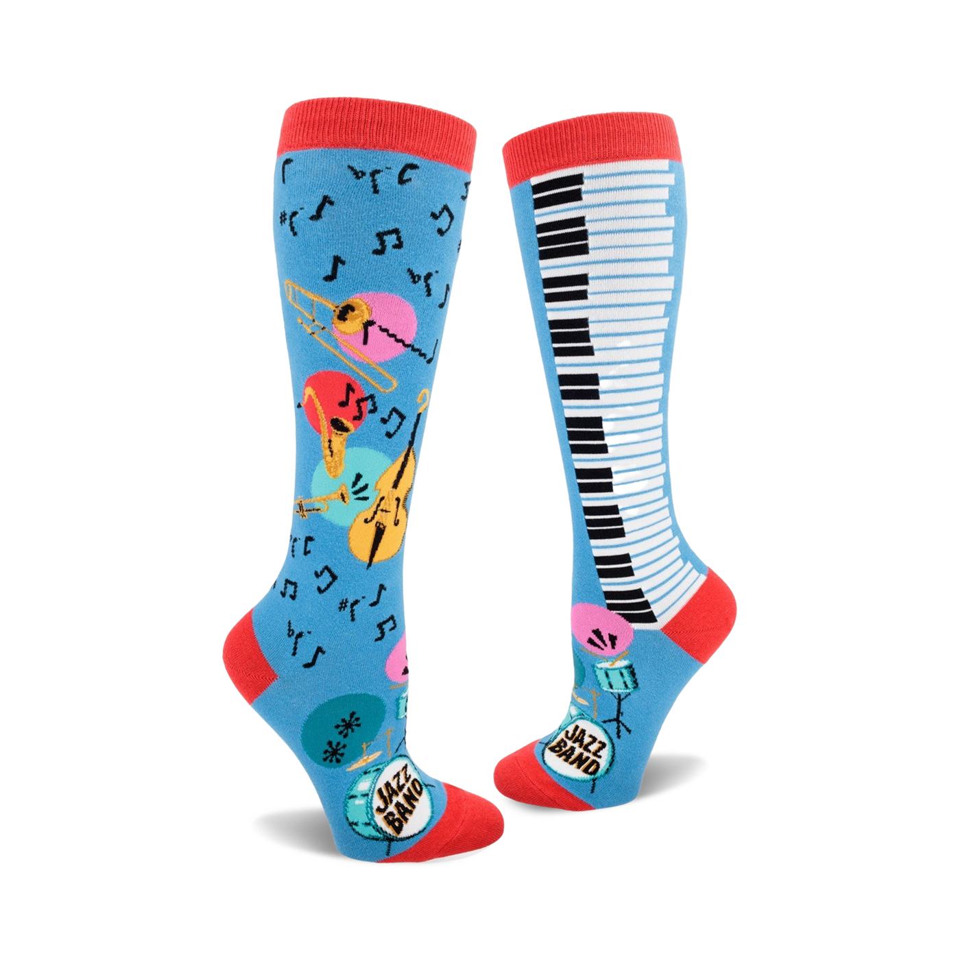 Pair of knee-high socks; one sock shows musical instruments and notes on a light blue background, the other shows a piano keyboard.  Red, pink, yellow, and teal accents.