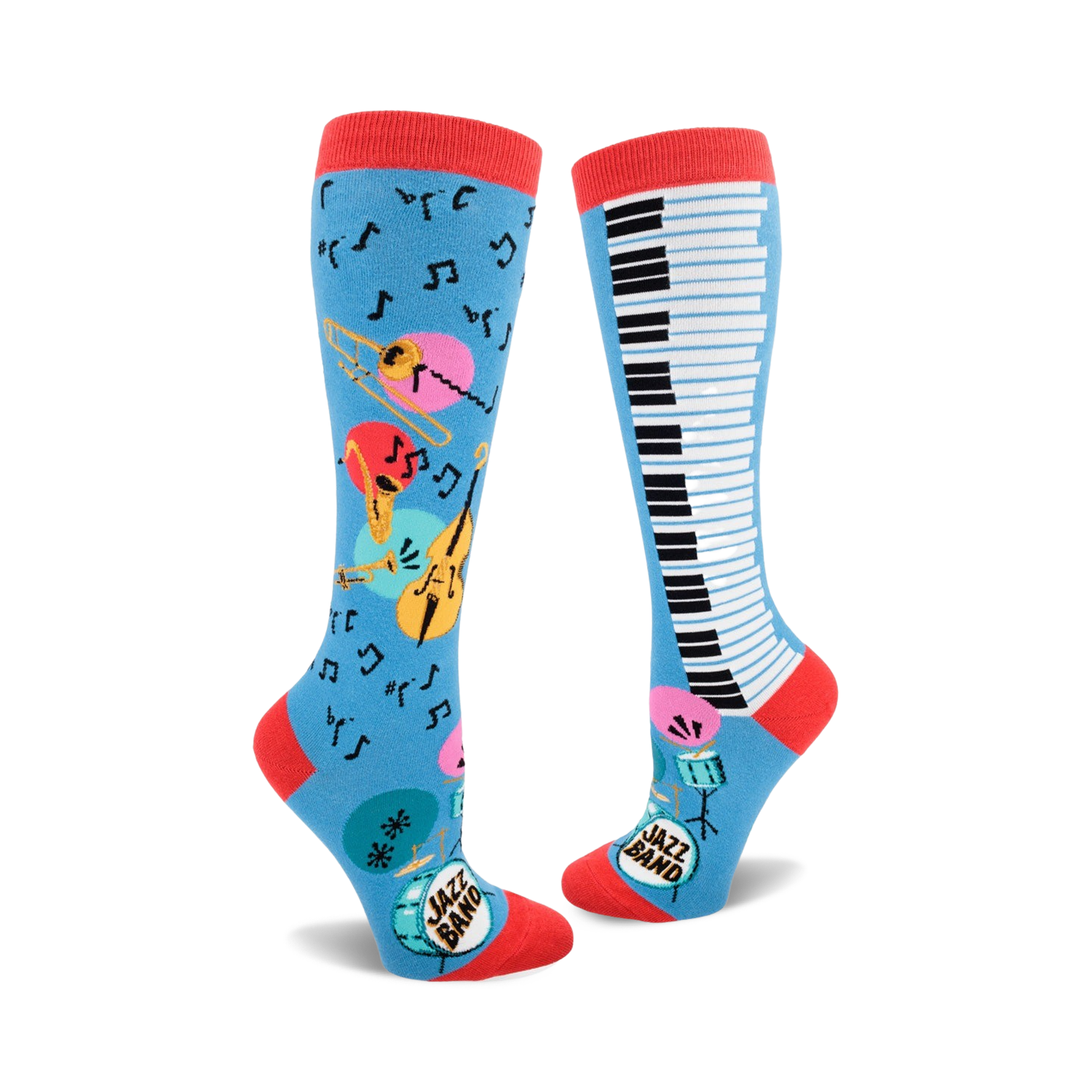 Pair of knee-high socks; one sock shows musical instruments and notes on a light blue background, the other shows a piano keyboard.  Red, pink, yellow, and teal accents.