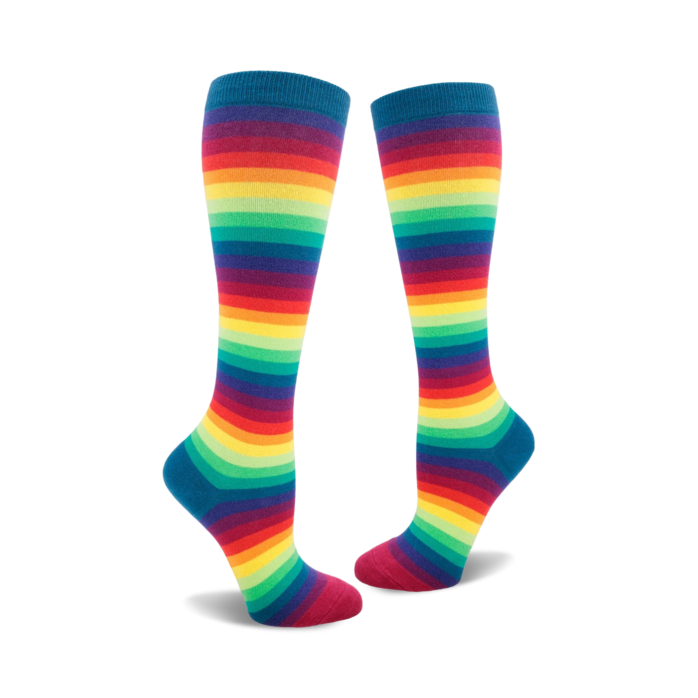 Pair of rainbow striped knee-high socks. Colors include red, orange, yellow, green, blue, indigo, and violet stripes on a dark teal base.