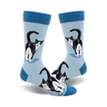 Lifestyle shot of Tuxedo Cat Butt socks on a person's feet, showing off the socks' fit and design.