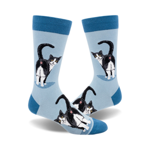 light blue crew socks for men featuring a pattern of black and white tuxedo cat butts.  