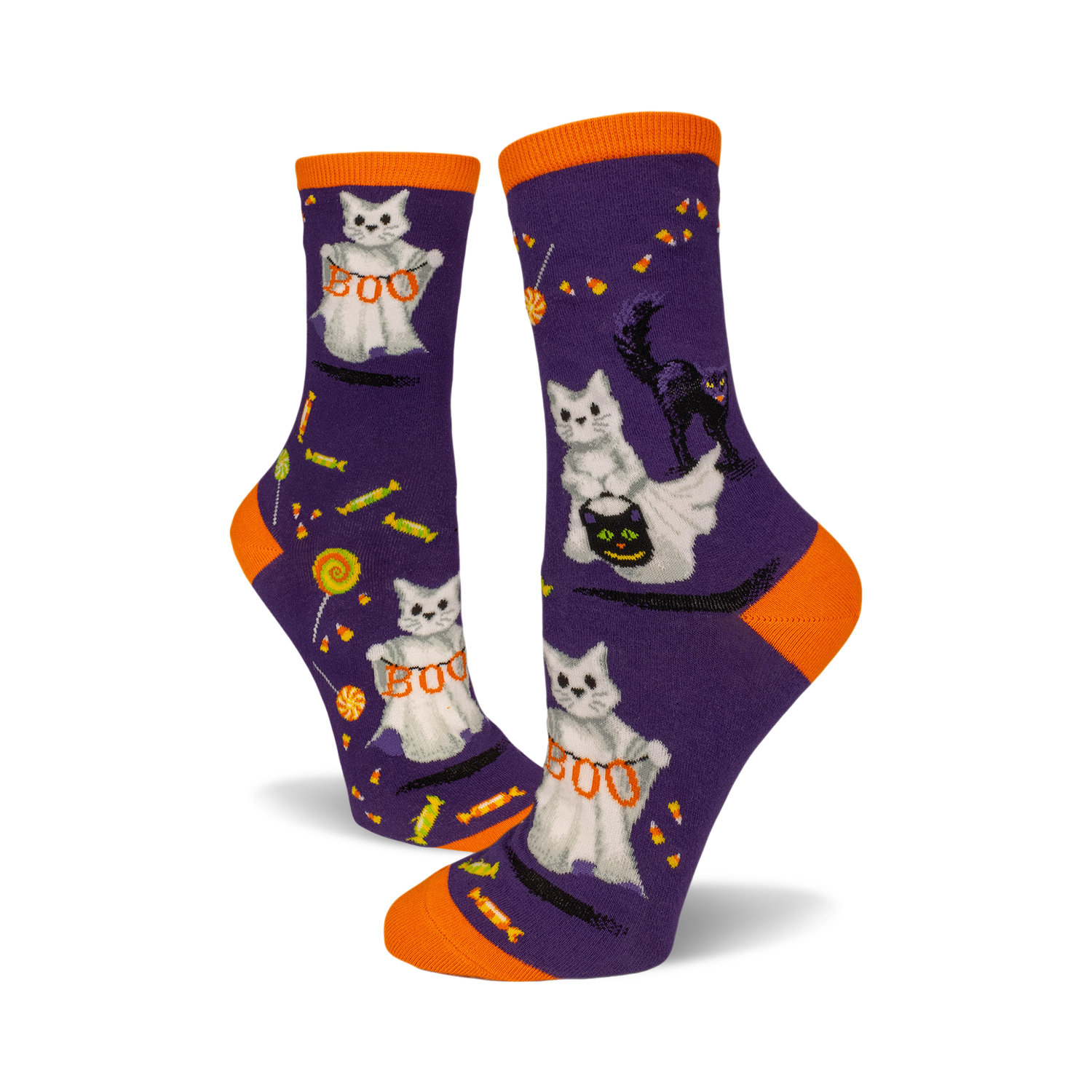 Crew socks in purple with orange cuffs.  Design features white ghost cats with "BOO" and candy corn on a dark purple background. A black cat is also shown.