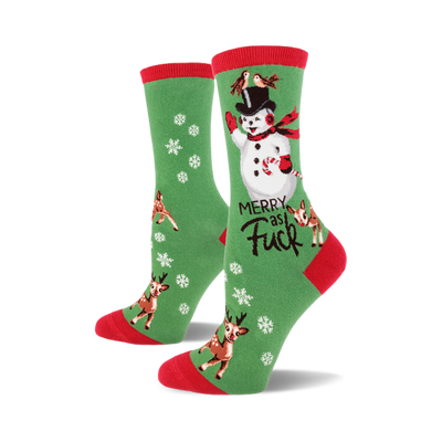 front view of women's crew socks; green with red trim, featuring a snowman with birds on his hat, candy cane, and reindeer; "merry as fuck" text.