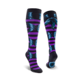 A pair of knee-high socks in purple and teal.  The socks feature a striped pattern and a dark teal bow design.