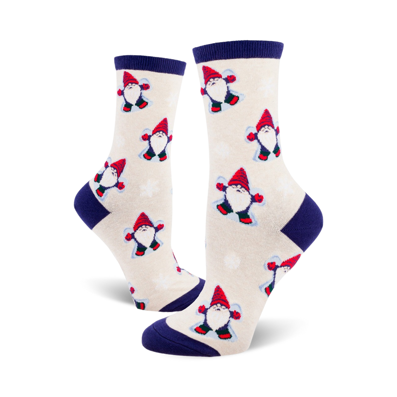 Cream crew socks with a repeating pattern of red-hatted snow gnomes making snow angels.  Navy blue cuffs.