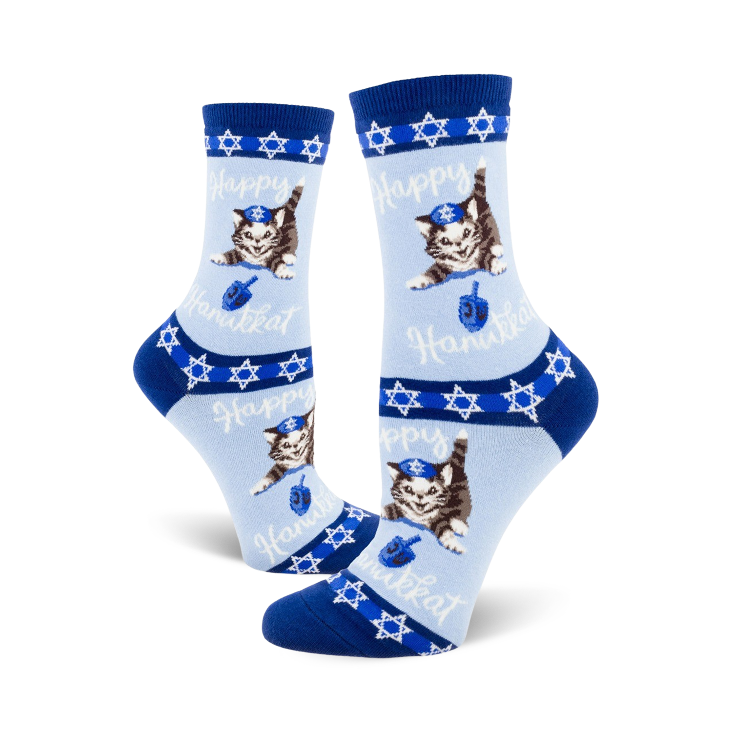 Crew socks in light blue, navy blue, and white.  The design features a repeating pattern of cats wearing yarmulkes and holding dreidels.  Text says 'Happy Hanukkah'.