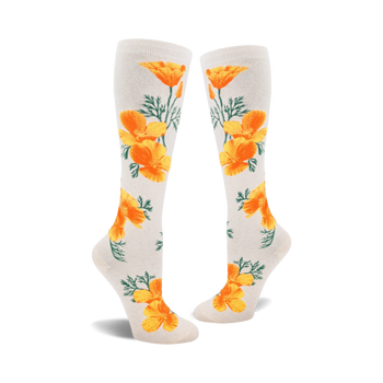 white knee-high socks with a pattern of orange california poppies. women's sock.   