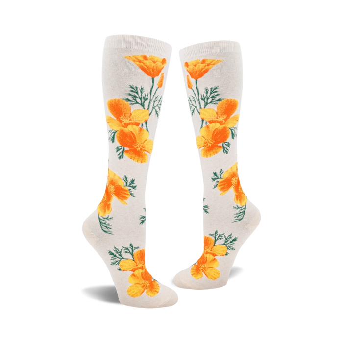 white knee-high socks with a pattern of orange california poppies. women's sock.    }}