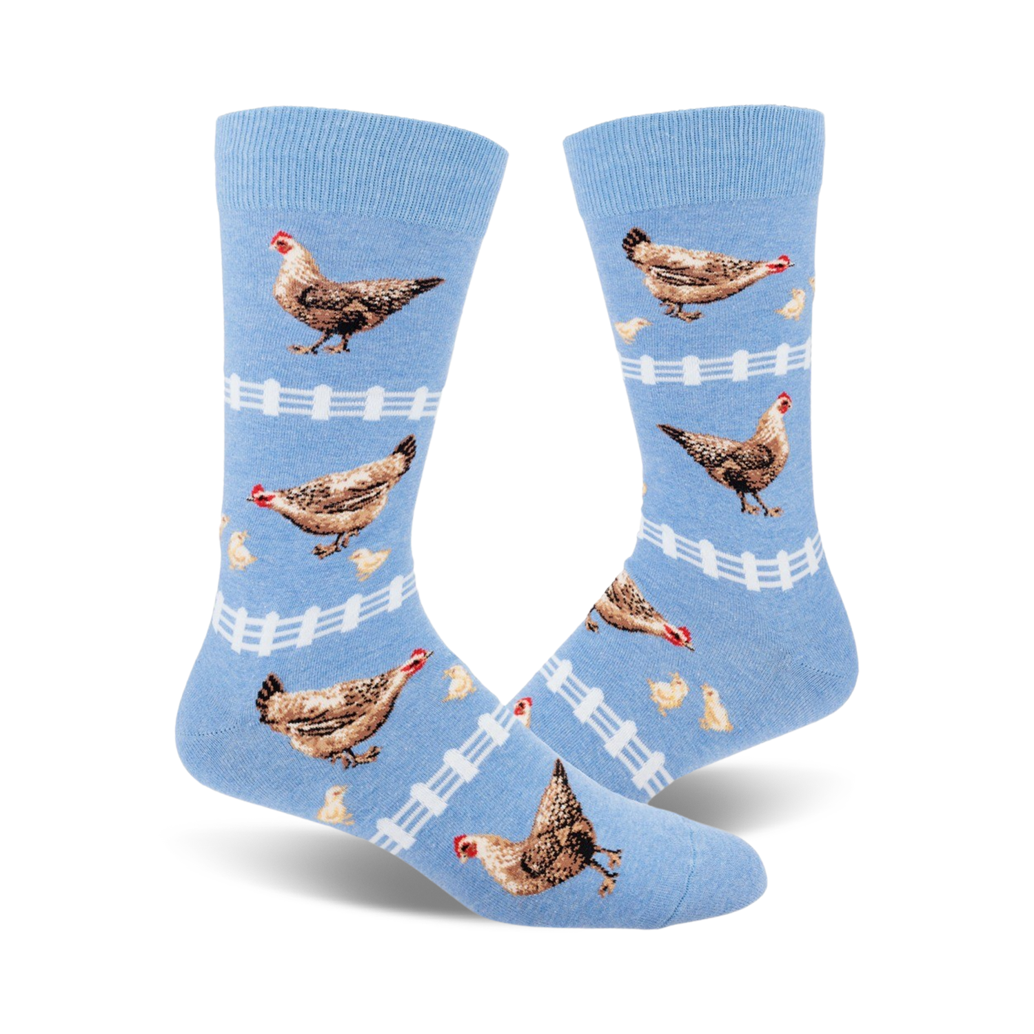 Pair of light blue crew socks with brown hens, yellow chicks, and white picket fences. Fun, whimsical design.
