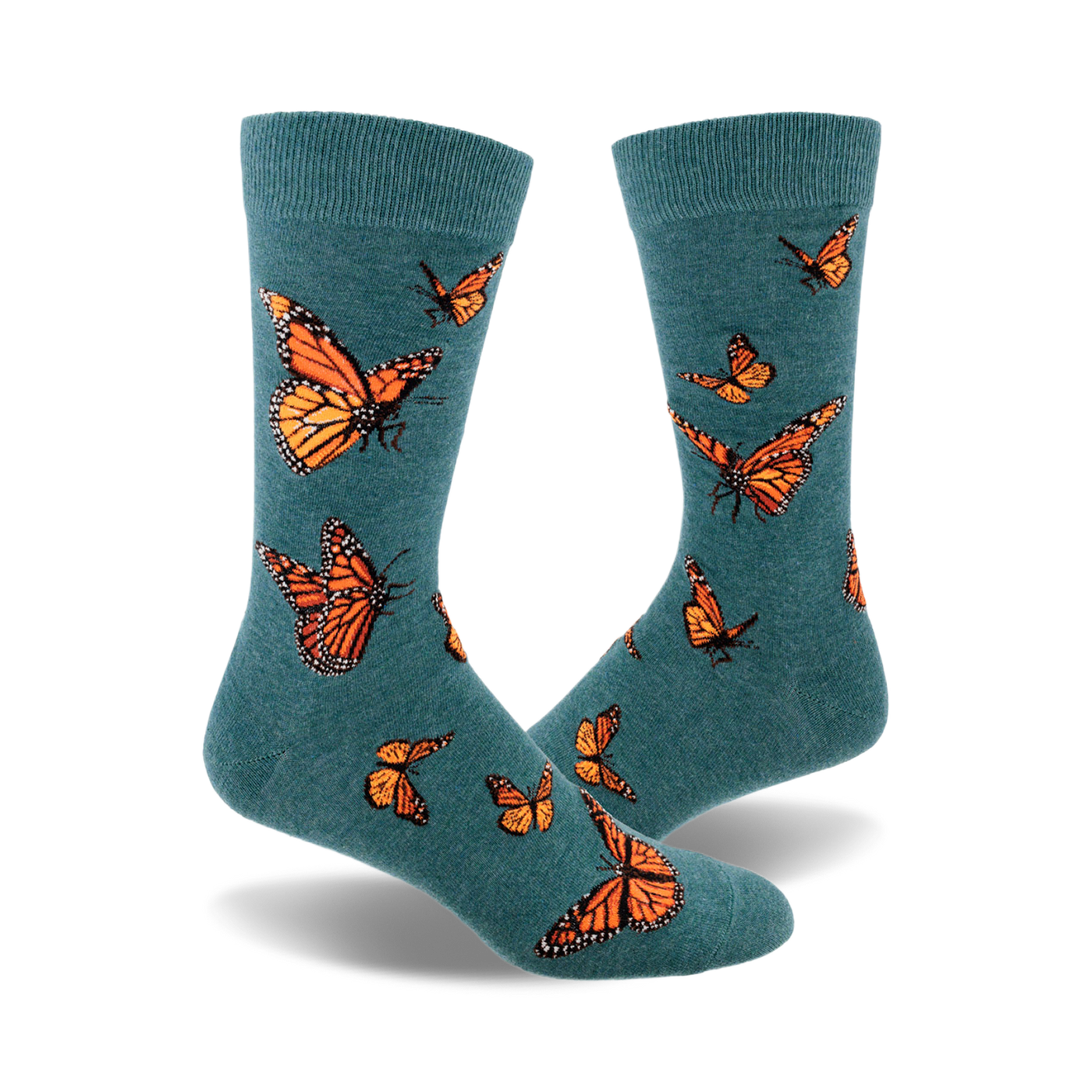 A pair of teal crew socks featuring a pattern of orange monarch butterflies.  A whimsical and nature-inspired design.