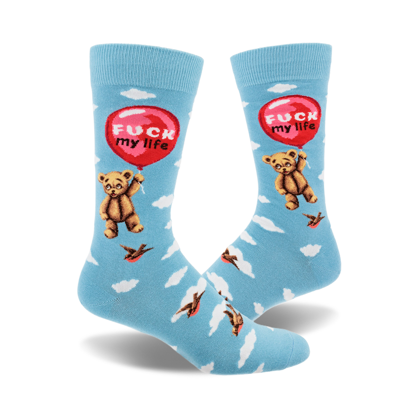Crew socks in light blue with a teddy bear holding a 'Fuck My Life' balloon, surrounded by clouds and birds. Funny and slightly dark design.