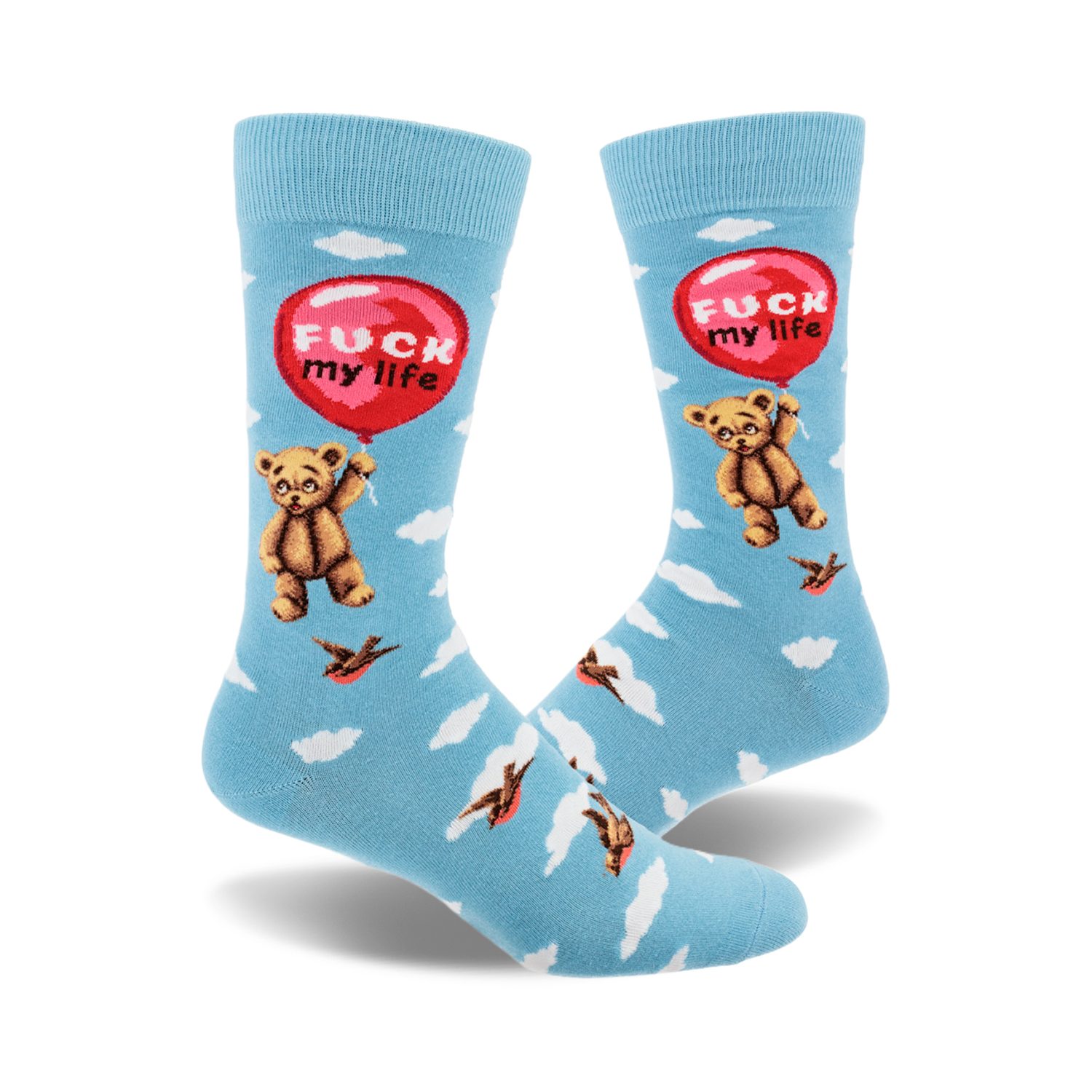 Crew socks in light blue with a teddy bear holding a 'Fuck My Life' balloon, surrounded by clouds and birds. Funny and slightly dark design.
