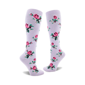 socks that are a light purple color with a pattern of pink roses, green leaves, and white flowers.