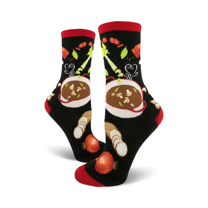 black crew socks with red toe, heel, and cuff feature a pattern of red and white soup bowls with black handles, carrots, celery, and mushrooms.   }}