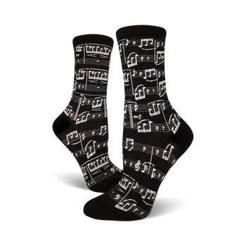  black crew socks with white musical notes pattern for women. perfect for music lovers.   