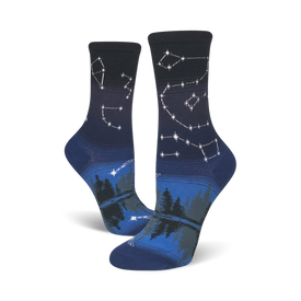 womens' crew socks - dark blue with a pattern of white stars and white and black pine trees.  