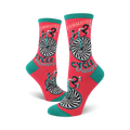 Crew socks in coral with teal cuffs. The design features a black and white hypnotic bicycle wheel and the words 'Cycle Therapy'.